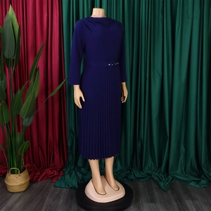 Detail of elegant navy blue pleated dress featuring long sleeves and a matching belted waist