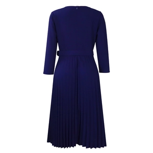 Detailed back view of navy pleated dress with waist belt and long sleeves
