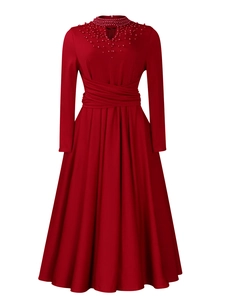 Close-up of elegant beaded high neck and gathered waist on a long red formal dress