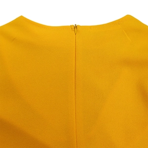 Close-up of bright yellow round neckline with seamless hidden zipper detail