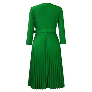 Detail of the emerald green pleated dress back showing invisible zipper and waist belt