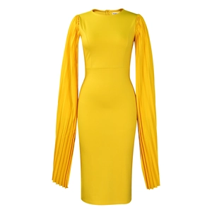 Detail of elegant yellow pleated sleeves on a slim evening midi dress for parties