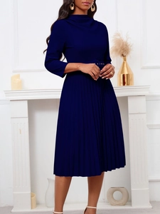 Elegant navy blue pleated dress with high neck, long sleeves and belted waist silhouette