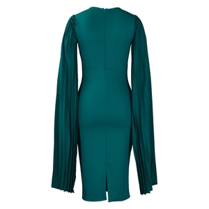 Detail of dark green dress showing pleated sleeves and back hem slit design