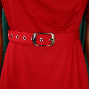 Close-up of red V-neck dress featuring a buckled waist belt with metallic eyelets