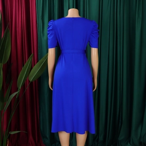 Detailed back view of a royal blue V-neck midi dress with puff sleeves and invisible zipper