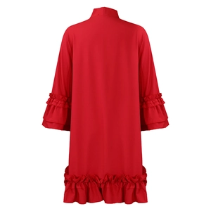 Detail view of red solid color dress back with tiered ruffle sleeves and hemline
