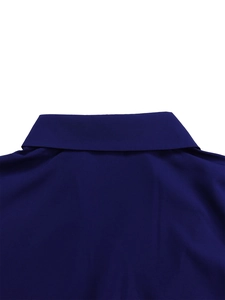 Detail of high-waist pleated dress collar showing navy blue smooth fabric texture