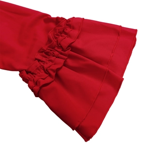 Detail of red tiered ruffle sleeves on loose casual dress with premium stitching