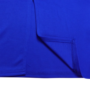 Detail of royal blue pleated fabric showing neat side seam stitching and hem craftsmanship