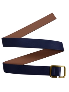 Close-up of navy blue and brown leather belt with a matte gold square pin buckle