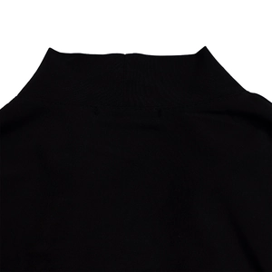 Detail of the high-quality mock neck collar and stitching on a solid black dress