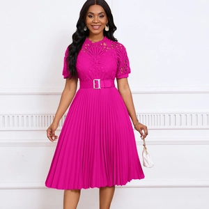 Close-up of fuchsia lace crochet bodice with short sleeves and pleated skirt detail