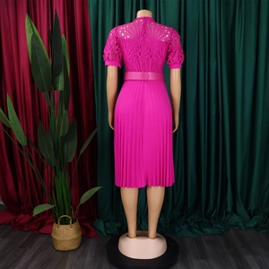 Detail of fuchsia pleated dress showing hollow lace back and invisible zipper closure