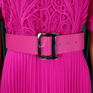 Detail of rose pink lace dress with pleated skirt and metallic D-ring buckle belt