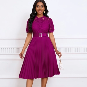 Detail of magenta dress with delicate lace bodice and sharp pleated skirt design