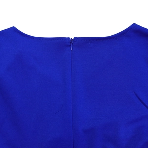Detail view of the v-neckline and invisible back zipper on this elegant royal blue dress