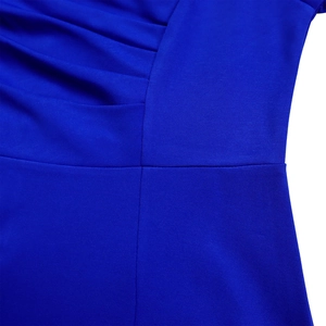 Detail of the elegant royal blue fabric with professional stitching and ruched texture