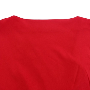 Detailed macro view of vibrant red woven fabric texture and V-neckline stitching