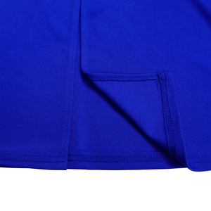 Detailed close-up of electric blue dress showing professional stitching and jersey fabric