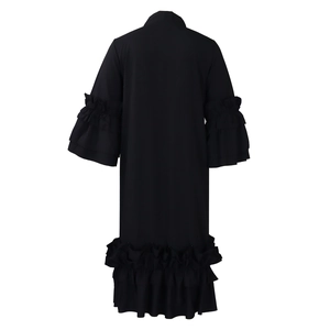 Detailed back view of a black maxi dress featuring elegant tiered ruffle sleeves and hemline