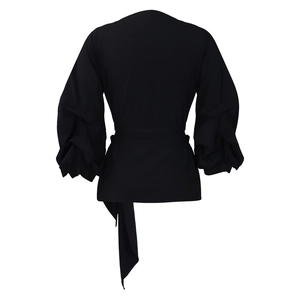 Back view of black puff sleeve blouse with pleated details and waist tie belt
