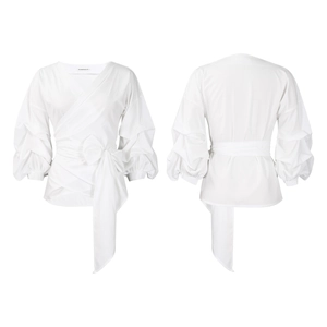 Detail of white wrap shirt with V-neck puff sleeves and waist tie on white background