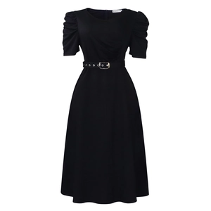 Close-up of black A-line dress featuring puff sleeves and a waist belt with metal buckle
