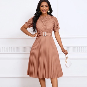 Detail of lace floral bodice and pleated skirt on an elegant dusty pink midi dress