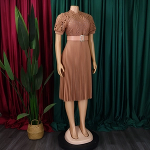 Detailed lace stitching and pleated texture on a short-sleeved light brown evening gown