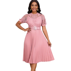 Detail of pink lace embroidery bodice and pleated skirt with matching buckled waist belt