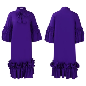Detail view of purple dress with elegant bow collar and layered ruffle sleeves