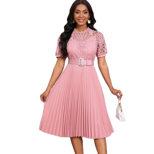 Detail of pink lace bodice with floral crochet and pleated skirt on a formal midi dress
