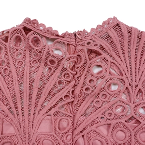 Detail of dusty pink lace dress with scallop collar and hidden back zipper