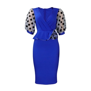 Royal blue V-neck dress featuring polka dot puff sleeves and 3D floral waist detail
