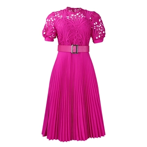 Detail of fuchsia lace stitching and pleated texture on this elegant party dress