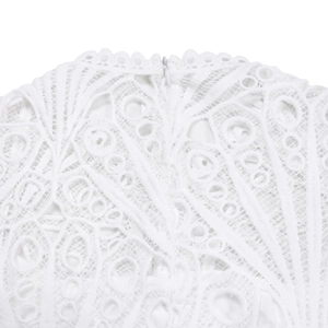 Detail of white floral lace neckline with a concealed zipper for African party dress