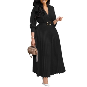 Detail of elegant black pleated dress with V-neckline, waist belt and lantern sleeves