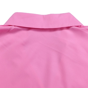 Detail of the pink pointed lapel collar on a long-sleeved woven shirt for women
