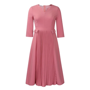 Detail of rose pink V-neck midi dress featuring pleated skirt and waist button accents