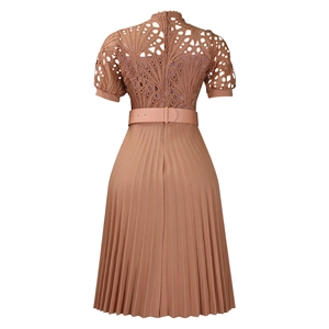 Back view detail of pleated dusty pink dress with lace patchwork and leather belt