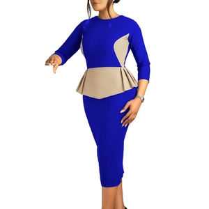 Detail of royal blue peplum dress with beige side panels and elegant three-quarter sleeves