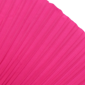 Macro view of pleated fabric detail in magenta pink with a silky texture and accordion folds