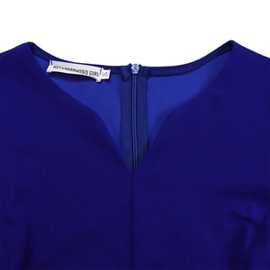 Detail of royal blue wave V-neckline with invisible back zipper and fine textured fabric