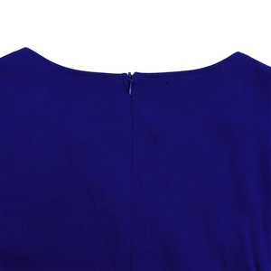 Detailed close-up of dark blue chiffon dress featuring hidden zipper closure at back