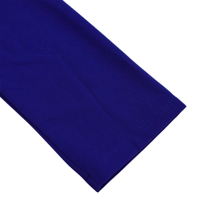 Detailed close-up of smooth stitching and knit texture on navy blue dress cuffs