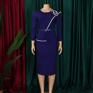 Detailed view of purple bodycon dress featuring white floral shoulder detail and waist belt
