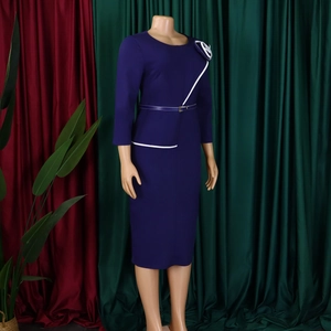 Detail of purple long-sleeved pencil dress with white piping and floral waist accents