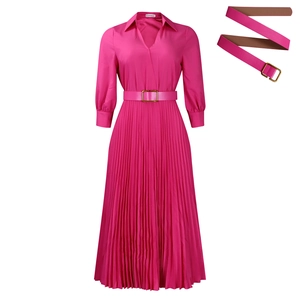 Detail of the rose red pleated dress featuring a classic lapel and leather belt with gold buckle