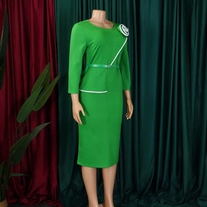 Green OL sheath dress featuring white spiral flower detail and elegant waist belt